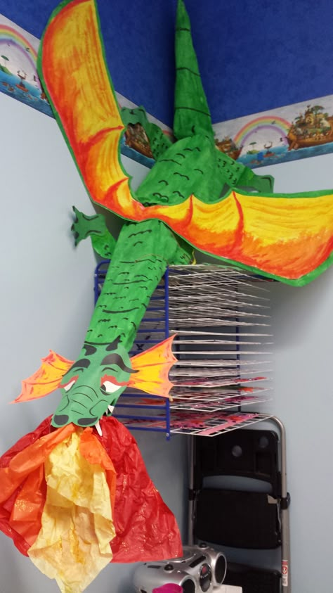 The dragon I made to hang in my classroom for fairy tale week Castle Classroom, Kingdom Vbs, Dragon Birthday Parties, Fairytale Decor, Medieval Decor, Medieval Party, Fairy Tale Theme, Dragon Tales, Dragon Birthday