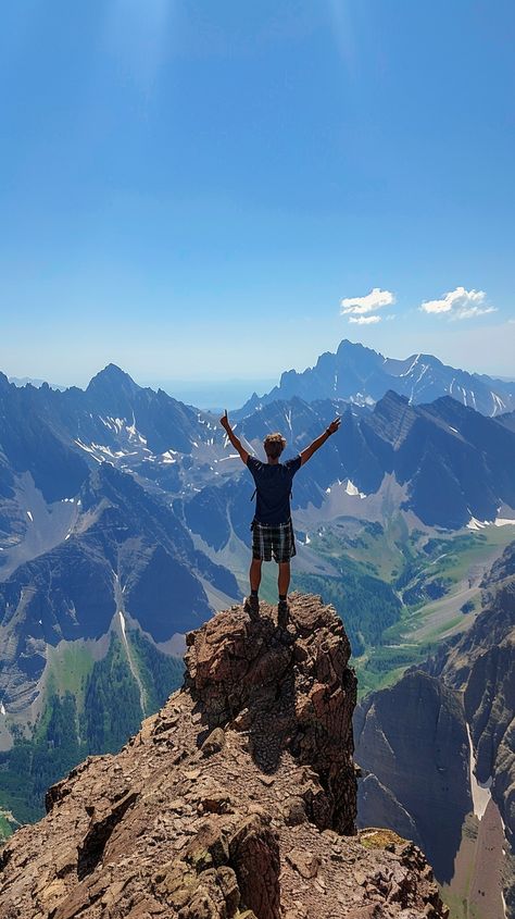 Summit Victory Pose: An exhilarating moment captured as a hiker raises arms in triumph atop a rugged mountain peak. #hiker #mountain #summit #triumphant #achievement #adventure #arms #raised #aiart #aiphoto #stockcake https://ayr.app/l/6DAJ Triumphant Pose, Mountain Summit, Instagram Wall, Victory Pose, American Holidays, Vision Board Manifestation, Spring 2025, Mountain Peak, Clear Blue Sky