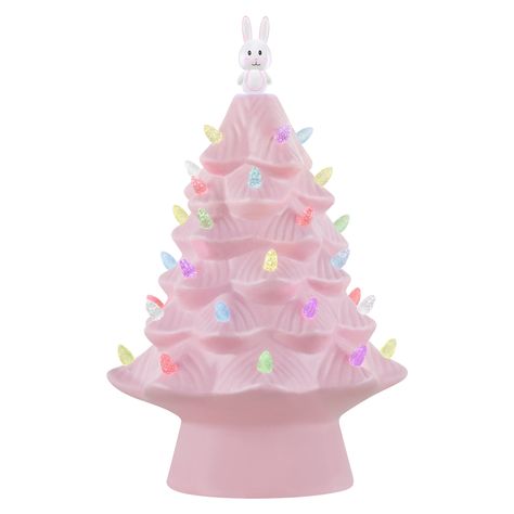 "Purchase Mr. Cottontail Pink 13\" Ceramic Easter Bunny Tree at Michaels. com. 13\" Nostalgic Easter Bunny Tree from Mr. Cottontail. Ceramic tree with pink polished finish. LED illuminated with pastel multi-colored bulbs and a Easter bunny topper. Adapter-operated with a timer. Your favorite vintage Christmas decoration just got an Easter makeover. This 13\" Nostalgic Easter Tree with LED lights by Mr. Cottontail is sure to be a new seasonal favorite with its vintage style and old-fashioned char Tree Table Decor, Ceramic Easter, Light Up Tree, Bunny Pink, Mr Christmas, Pink Tree, Glossier Pink, Tree Table, Miniature Trees