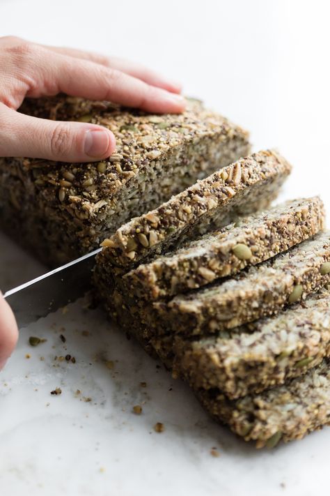 Ancient Grain, Seed, and Nut Loaf From The Greenhouse CookbookFor day one of our plant-based challenge, we’re getting our meal in early. We’re nibbling on this dense, dark loaf, first featured in The Greenhouse Cookbook, and inspired by the... Gluten Free Ezekiel Bread Recipe, Nut And Seed Bread Recipe, Seeded Bread Recipes, Dried Garlic, Nut Loaf, Bagel Toppings, Sprouted Grain Bread, Healthy Foods To Make, Pan Sin Gluten