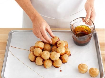 How to Make Croquembouche : Food Network | Recipes, Dinners and Easy Meal Ideas | Food Network Croquembouche Recipe Easy, Crocombuche Recipe, Crocombuche Cake, Croquenbuche Christmas, Croquembouche Christmas, Mini Croquembouche, Christmas Croquembouche, Wedding Croquembouche, Croquembouche Recipe