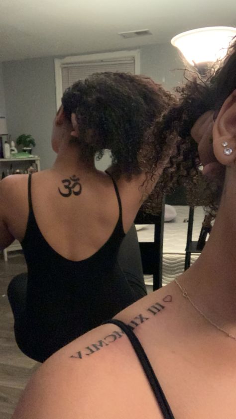 Om Back Tattoo Women, Om Tattoo Black Women, Arabic Tattoo Back Spine, Black Spiritual Tattoos, Om Tattoo Back, Back Tattoo Spiritual, Spiritual Neck Tattoo, Henna Spine Tattoo, Spiritual Spine Tattoos