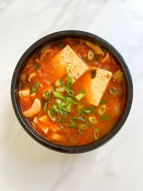 Having massive cravings for kimchi so I’ve decided to make “kimchi jjigae”!!🍲It never fails to hit the spot ☺️ Ingredients: - kimchi (the older the kimchi, the better for stews. It’s more funky & flavorful👌) - 1 egg - King oyster mushroom (1-2) - Tofu - 6 squares or so - Dried anchovies - a handful - Dried kelp - 2 1x1 in pieces - Water - 3 cups - Gochugaru (korean chili flake)1 tsp adjust to how spicy you want it - Gochujang (korean chili paste) 1 tbsp - adjust to how spicy you want it - Kimchi Jiggae Korean, Kimchi Jjim, Kimchi Recipe Ideas, Kimchi Soup Recipe, Kimchi Jigae, Kimchi Stew Recipe, Water Kimchi, Dried Anchovies, Kimchi Recipes