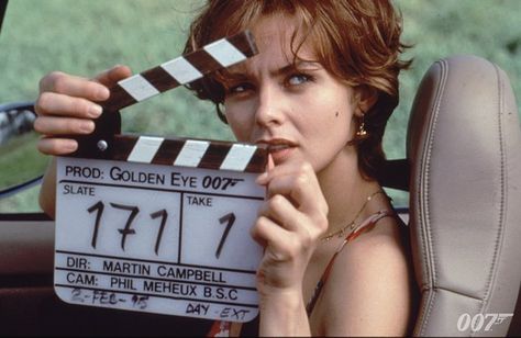 Izabella Scorupco on the set of GOLDENEYE (1995). Clapperboard Aesthetic, Bond Babe, Carey Lowell, James Bond Women, Bond Women, Britt Ekland, Bond Series, Ursula Andress, Kim Basinger