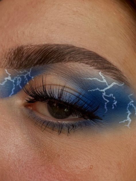 Thunderstorm Makeup Look, Storm Makeup Look, Blue Lightning Eye Makeup, Lightening Makeup Looks, Marvel Eye Makeup, Superhero Inspired Makeup, Lighting Bolt Makeup Look, Rave Eyeshadow Looks, Lightning Makeup Eye