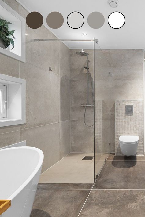 Beautiful combo of greys. Olive, grey, light grey, dark grey & then using accents of white.   Big tiles always work. Open showers always work. simple decor  #modernbathroom #contemporarybathroom  #minimalistbathroom #modernbathroomideas #modernbathroomdesigns #modernbathroominspo #contemporarybathroomideas #contemporarybathroomdesigns #contemporarybathroominspo #minimalistbathroomideas #minimalistbathroomdesigns #minimalistbathroominspo #modernbathrooms #contemporaybathrooms #minimalistbathrooms Big Grey Tiles Bathroom, Simple Grey Bathroom, New Tiles Design For Bathroom, Minimalist Grey Bathroom, Light Grey Bathroom Floor, Bathroom Tile Grey, Light Grey Bathroom Ideas, Light Gray Bathroom, Neutral Bathrooms Designs