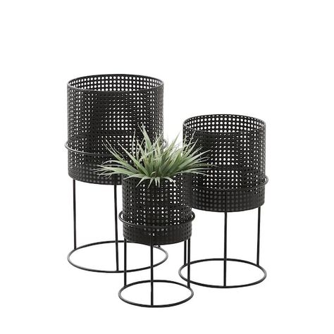 "Buy CosmoLiving by Cosmopolitan Black Metal Chic Planter Set at Michaels. com. Complement the simplicity and minimalism of the interior of your modern inspired living space with this 3-piece set of black metal basket weave pattern planters. Complement the simplicity and minimalism of the interior of your modern inspired living space with this 3-piece set of black metal basket weave pattern planters. This metal garden planter set features a construction that can withstand both the indoors and ou Contemporary Planters, Iron Planters, Glam Modern, Black Planters, Cosmoliving By Cosmopolitan, Indoor Outdoor Planter, Modern Style Homes, Metal Baskets, Modern Planters