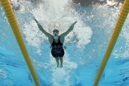 LONDON, ENGLAND - JULY 28:  Dana Vollmer of the United States competes in heat six of the Women's 100m Butterfly on Day One of the London 2012 Olympic Games at the Aquatics Centre on July 28, 2012 in London, England.  (Photo by Adam Pretty/Getty Images) Olympic Swimmers Women, London Aquatics Centre, Olympic Pool, Caeleb Dressel, 2004 Olympics, Swimming Photos, Katie Ledecky, 2016 Olympic Games, Olympics 2024