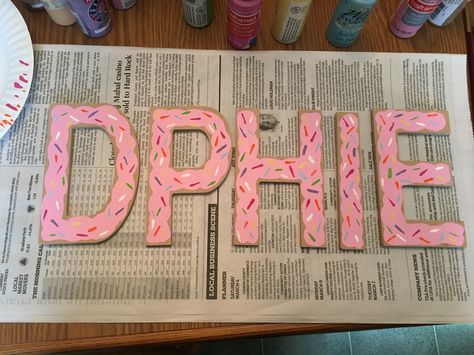 Donut painted sorority wood letters delta phi epsilon #donut #dphie #deltaphiepsilon #sorority  #diy Wood Sorority Letters, Painted Wooden Letters Sorority Cute Ideas, Sorority Letters Painted Wooden, Sorority Painted Letters, Sorority Wooden Letters, Wooden Sorority Letters, Painted Sorority Letters, Greek Letters Painted, Sorority Letters Painted