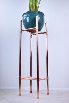 Broad Tall Copper Plant Stand By Proper Copper Design | notonthehighstreet.com Copper Plant Stand, Copper Pipe Projects, Copper Aesthetic, Copper Diy Projects, Wedding Showroom, Big Indoor Plants, Copper Plant, Copper Furniture, Copper Interior