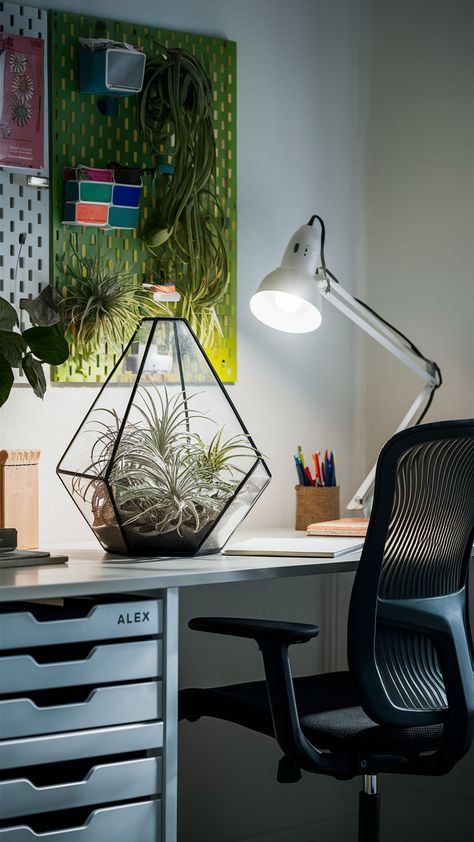 Revitalize your workspace with the perfect blend of style and productivity! Discover how air plants nestled in a chic geometric terrarium can enhance your home office aesthetic. Paired with the sleek 'ALEX' drawer unit and ergonomic 'MARKUS' chair, this setup is not only functional but also inspiring. Add a splash of color with a 'SKÅDIS' pegboard and enjoy bright task lighting from the 'TERTIAL' lamp. Ready to transform your office? Click for more styling tips and ideas! #HomeOfficeInspiration #AirPlants #IKEADecor #WorkspaceGoals #PlantStyling #ProductiveSpaces #TerrariumDesign Ikea Style, Home Office Aesthetic, Alex Drawer, Office Aesthetic, Ikea Decor, Geometric Terrarium, My Workspace, Drawer Unit, Task Lighting