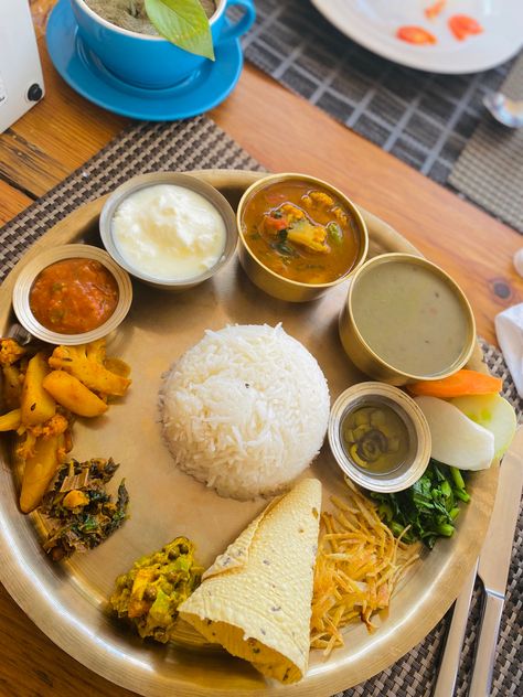 Traditional Nepali thali Nepali Food Traditional, Pickle Salad, Nepal Food, Veg Thali, Nepali Food, Brass Plates, Healthy Food Menu, Vegetable Rice, Non Veg