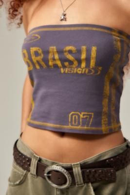 Visit Brasil in this strapless bandeau top with faded sporty graphics throughout. Stretchy cotton tube top with a straight neck and a cropped hem finished with contrast yellow stitching. **About Better Cotton** \- By choosing our cotton products, you’re supporting our investment in Better Cotton’s mission \- This product is sourced via a system of mass balance and therefore may not contain Better Cotton \- Bettercotton. org/massbalance **Content + Care** \- 100% Cotton \- Machine wash **Size + F Tank Top To Tube Top, Long Strapless Top, Brasil Top, Urban Outfitters Style, Urban Outfitters Top, Yellow Clothes, Urban Outfitters Clothes, Bandeau Tops, Yellow Crop Top