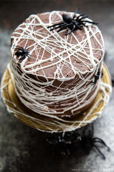 Chocolate Spider Web Cake. Three layer chocolate cake frosted with simple chocolate buttercream and decorated with marshmallow spider webs. It's the perfect Halloween treat! Chocolate Spider Web, Halloween Chocolate Cake, Ghostbuster Birthday, Basic Dough Recipe, Spider Web Cake, Chocolate Spiders, Chocolate Buttercream Recipe, Chocolate Cake Frosting, Easy Halloween Cookies