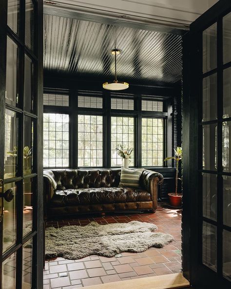 Black And White Sunroom, Black Sunroom, Victorian Sunroom, Brown Leather Chesterfield Sofa, Black French Doors, Jean Stoffer Design, Jean Stoffer, East Grand Rapids, Sitting Space