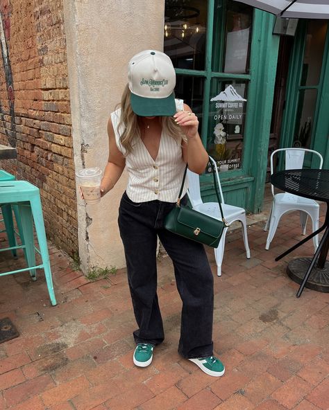 You can usually find me with a coffee, baggy jeans and sneakers ☕️🖤🤍 Vest: @hm Jeans: @abercrombie Sneakers: @adidas Hat: @amazonfashion Bag: @amazon Jewelry: @bypavoi #ootd #denimstyle #minimalstyle #streetstyle #pinterestinspired #ootdfashion #minimalstreetstyle Outfit of the day, street style, trucker hat outfit, baggy jeans outfit, outfit inspo, outfit ideas, minimal street style, pops of green, cool girl outfit, casual outfit, basic outfit Adidas With Jeans Outfit, Green Adidas Outfit Women, Green Trucker Hat Outfit, Outfit With Trucker Hat, Green Adidas Outfit, Outfit With Baseball Hat, Green Sneakers Outfit, Green Hat Outfit, Green Bag Outfit