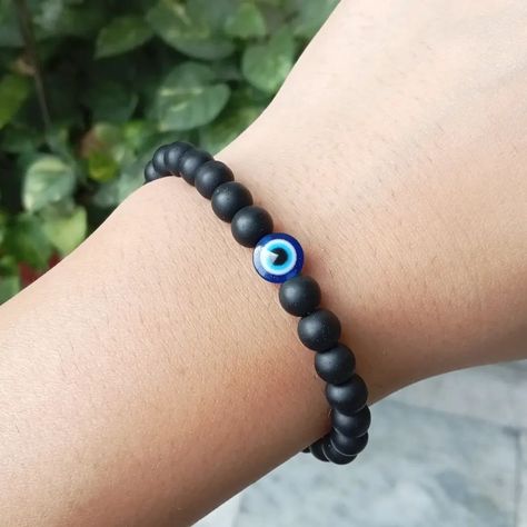 Unisex Bracelets with Evil Eye Protection 🧿 for casual wear and dangling silver charm 🪄 This bracelet shields you against Negativity and it has power to protect and cleanse your energetic space. It also protects you from psychic attacks by healing emotional and physical pain. Order from website link in bio ✅ FREE shipping in Jalandhar. DM for details 📥 #evileyebracelet #evileyejewelry #evileyeprotection #dailywearjewellery #blackbracelets #braceletformen #unisexjewelry #fypage #fy #fyp Psychic Attacks, Eye Bracelets, Daily Wear Jewellery, Evil Eye Protection, Psychic Attack, Physical Pain, Unisex Bracelets, Black Bracelets, Evil Eye Bracelet