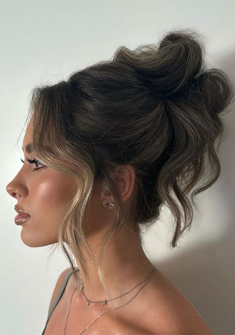 Soft Tousled High Bun with Face-Framing Waves, 90s inspired high updo, , Updo Hairstyle, updo wedding hairstyle High Bun Veil Bridal Hairstyles, High Loose Bun Wedding, On Trend Updos, High Updos For Medium Length Hair, High Up Do, High Messy Bun Wedding Hair, Wedding High Updo, Brunette Updo Wedding, Bridal High Updo