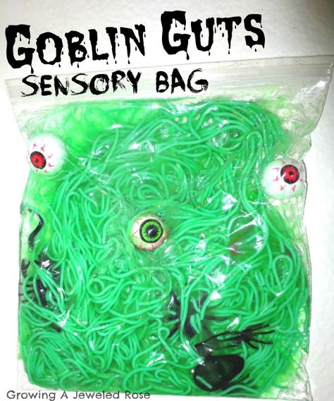 Goblin Sensory Bag: zip-lock bag cooked pasta green food coloring eye balls, spiders, snakes (anything you think will make good goblin guts) Clear hair gel clear packaging tape October Infant Sensory, Infant Halloween Sensory Ideas, Sensory Halloween Activities, Halloween Sensory Bags, Halloween Sensory Activities, Halloween Games For Toddlers, Pasta Green, Halloween Infantil, Sensory Bag