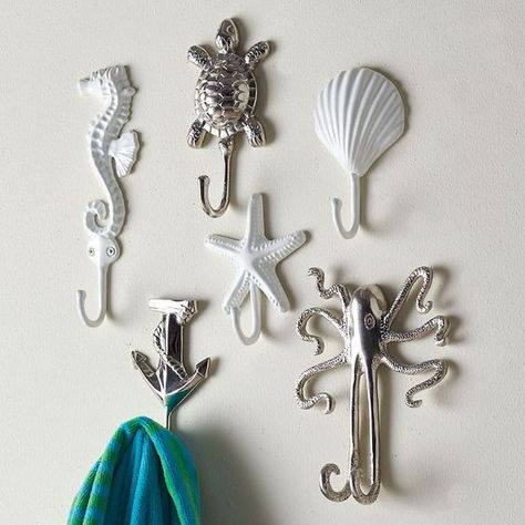 sea reature towel hooks are an easy and cheap idea to add an ocean flavor to the decor Little Mermaid Bathroom, Mermaid Bathroom Decor, Mermaid Bedroom, Mermaid Bathroom, Nautical Bathroom Decor, Mermaid Room, Beach Theme Bathroom, Beach Bathroom Decor, Nautical Bathrooms