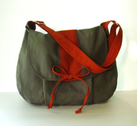 Feel free to suggest to us any changes you would like to make to our design.  This everyday bag is made from cotton canvas, sturdy and durable material. It is roomy and big enough to hold your laptop (up to 15"), books, ipad, scarf and everyday essentials . It's a color that goes with everything. Interior : Burnt orange canvas 1 big zippered pocket 1 opened pocket 1 pen slip 1 swivel clip Exterior : Grey cotton canvas 1 open front pocket I make each bag individually by hand with lots of care, so Messenger Bag School, Handbag School, Laptop Purse, Diaper Bag Tote, Bag School, Canvas Messenger Bag, Fashion Business, New Energy, Mode Inspo