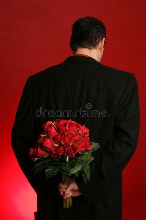 Man holding roses behind his back. Man holding out large bouquet of red roses be , #AFFILIATE, #roses, #holding, #Man, #large, #backdrop #ad Men With Roses Photography, Holding Roses Pose, Man With Flowers In Hand Aesthetic, Man Holding Flowers Pose Reference, Man Bringing Flowers, Man Holding Flowers Aesthetic, Man With Flowers In Hand, Men With Flowers Photography, Men Holding Flowers