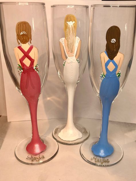 Custom hand painted to your specifications   Back of dress, hair color and style, and names personalized on the base    Perfect for bridesmaid proposal, bridal shower, wedding favors and bachelorette party Champagne glasses   Price per glass Painting Champagne Glasses, Bridesmaid Painting, Champagne Glass Painting, Bachelorette Party Champagne, Painted Champagne Glasses, Bridesmaid Champagne Glasses, Bridal Glasses, Champagne Glasses Decorated, Champagne Bachelorette Party