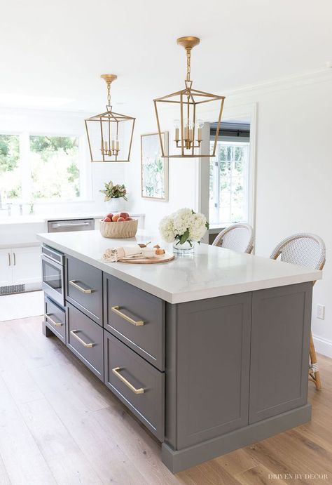 Loving all of the deep drawer space in this long kitchen island (and love the shade of gray!) #kitchen #kitchens #kitchenrenovation #kitchenreno #kitchenremodel #kitchendesign #kitchenideas #lighting #kitchenisland #countertops Kitchen With Long Island, Driven By Decor, Long Kitchen, Gray And White Kitchen, White Kitchen Remodeling, New Kitchen Cabinets, Cabinets And Countertops, Kitchen Cabinets Makeover, Kitchen Farmhouse