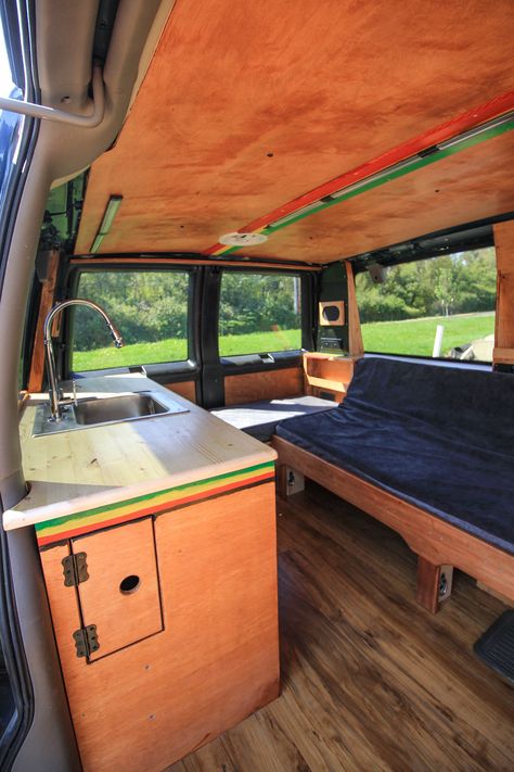 Could you live in an ultra-small space? Check out this rasta-themed Astro Van conversion by Freedom Vans! #van #vanlife #smallspace #tinyhouse #tinyhome #tinyliving #astrovan #chevyastro #kitchen #kitchenette #freedomvans #vanconversion #convertedvan #convertedastro Astro Van Conversion, Van Life Interior, Ford Transit Connect Camper, Ford Transit Conversion, Chevy Astro Van, Mini Vans, Camper Diy, Diy Campervan, Astro Van