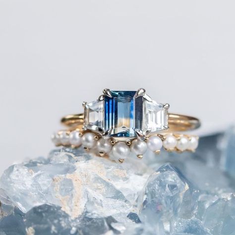 Anueva Jewelry - earthy engagement rings inspired by the PNW on Instagram: "Eclectic combinations bring a smile to our faces here at Anueva ☺️. This 1.28ct Tanzanian bicolor blue and white sapphire pairs so well with the new pearl band. Search “1.28ct” to find this low profile three stone ring on the site!" Bicolor Sapphire Engagement Ring, Earthy Engagement Rings, Bicolor Sapphire, Halo Jewelry, Blue Sapphire Engagement Ring, Three Stone Ring, Sapphire Engagement Ring Blue, Bridal Engagement Rings, Sapphire Engagement Ring