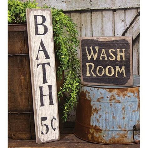 The Wash Room Barnwood Sign is a decorative sign made of chunky, distressed barn-style wood. The sign is given a washed black paint finish and reads “Wash Room” in painted ivory lettering. This sign is perfect for a primitive or farmhouse theme, displayed freestanding or hanging on a wall, using the wire hanger, in any Primitive Crafts Diy, Primitive Bathroom Decor, Primitive Bathroom, Barn Bathroom, Rustic Farmhouse Bathroom, Bath Sign, Bathroom Towel Decor, Farmhouse Theme, Wash Room