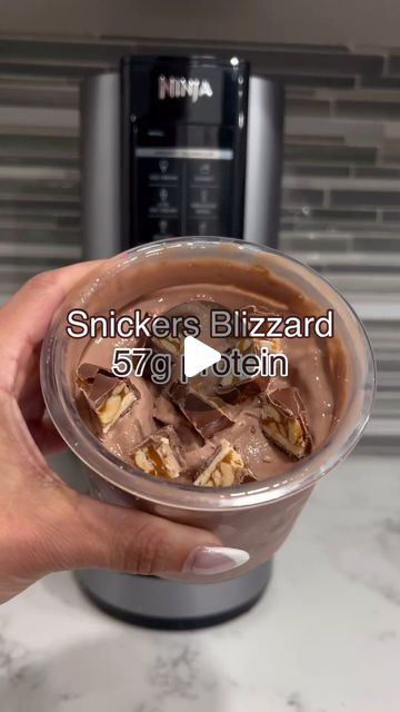 Ninja Creami Recipes | High Protein | Ice Cream on Instagram: "Try this homemade Snickers Blizzard with your Ninja Creami and let us know what you think! 🤤🤤🤤🤤  Video credit: @minnyhustlers   Follow @creamiwrld for more daily recipes!  Macros for the base: 57g of protein, just 14g of carbs, and 6g fat for a total of 333 calories - this treat doesn’t just taste indulgent, it fuels your gains too! 😤💪  Toppings? Go ahead, treat yourself; you’ve earned it. 🌟  #HighProtein #NinjaCreamiRecipe #NinjaCreami" Ice Cream Maker Recipes Healthy, Protein Drink Recipes, Ninja Ice Cream Recipe, Protein Ice Cream Recipe, Ice Cream Videos, Protein Ice Cream Recipes, Snickers Ice Cream, Healthy Ice Cream Recipes, Homemade Snickers