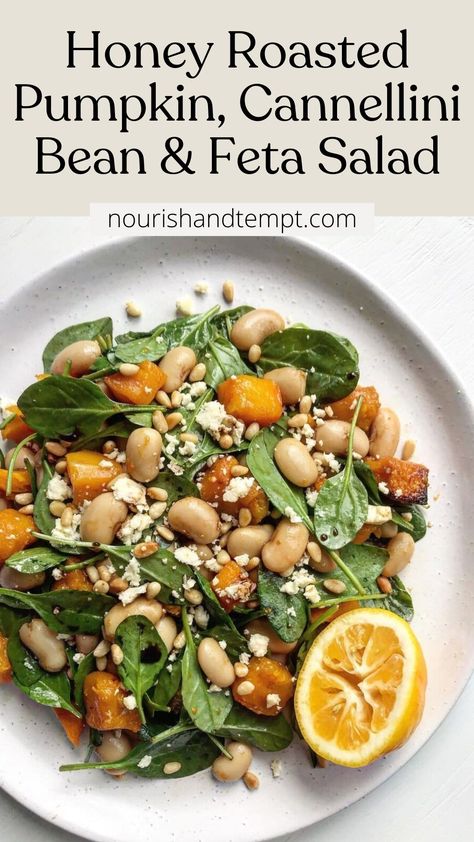 A birds-eye of a salad with roasted pumpkin, spinach pine nuts and feta. Roasted Pumpkin Salad, Pumpkin Feta, Roast Pumpkin Salad, Cannellini Bean, Vegetarian Salad, Pumpkin Salad, Roasted Pumpkin, Vegetarian Salads, Salad Dishes