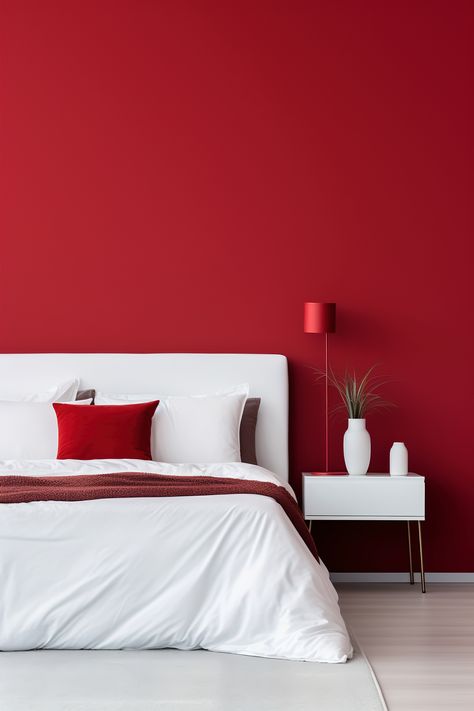 Showcase your love for minimalist design and bold hues with this scarlet red bedroom, featuring clean lines and white linen. Red And White Room, Gray Red Bedroom, Red And White Bedroom, Bedroom Painting Ideas, Red Feature Wall, Red Bedroom Ideas, Red Room Decor, Red Bedroom Decor, Split Complementary