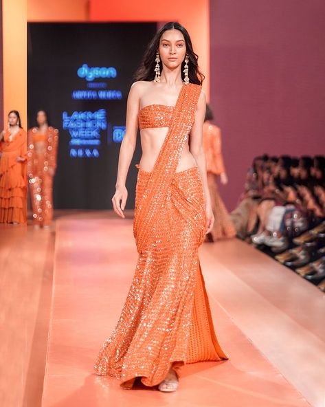 Arpita Mehta Official on Instagram: “On Tamanna - Toasted Orange hand embroidered sequin & mirror sari with a bandeau blouse. #ArpitaMehta #SummerOf23 #Mirrorwork” Orange Drapes, Arpita Mehta, Cotton Suit Designs, Haldi Ceremony Outfit, Mango Clothing, Haldi Outfits, Draped Saree, Orange Saree, Drape Saree