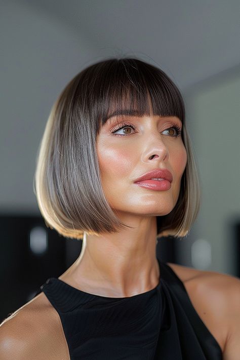 Woman with a glossy polished bob and sleek blunt bangs in a cool ash tone. Shaggy Bob With Curtain Bangs, Bob 2024, Bob With Curtain Bangs, Bob Haircuts With Bangs, Shaggy Bob, Bob Hairstyles With Bangs, Chin Length Hair, Bob Haircut With Bangs, Hair Color And Cut