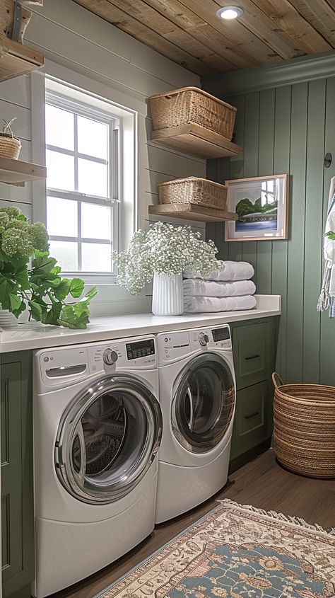 functional to fabulous with our curated collection of 44 elegant laundry room ideas that exude timeless style and sophistication. Dive into a world of chic design elements, luxurious finishes, and clever organizational solutions that will transform your laundry room into a space you'll love spending time in. Cottage Laundry Room Decor, Laundry Room With Plants, Laundry Room Ideas With Window Above Washer And Dryer, Nancy Meyers Laundry Room, Light Green Laundry Room, Evergreen Fog Laundry Room, Laundry Room With A Window, Laundry Room Green Cabinets, Sage Laundry Room