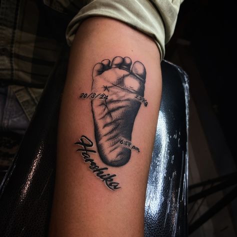 Baby foot print tattoo that defines a father’s love for his kid . . . . Book your appointment- 7509287115 Tattoo done by @inkbunny69 @ink69tattoos #tattoo #tattooideas #tattoos #tattoodesign #tattooartist #tattooartist Ultrasound Tattoo, Baby Hand Print Tattoo, Baby Foot Print Tattoo, Hand Print Tattoo, Baby Tattoo For Dads, Foot Print Tattoo, Hand Print Tattoos, Tattoo Mom, Kid Book