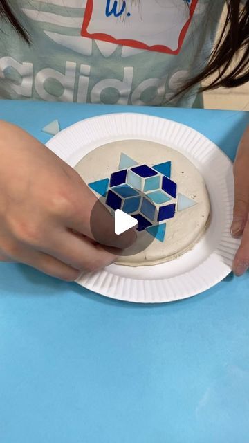 Tracy Boberg Nichols on Instagram: "Making mosaic radial patterns with these little cut glass pieces pressed into air dry clay. After the clay dried , we put modge podge all over it and then hot glued the clay disc to some cardstock for backing that we cut to size. Loved these! . .  . #artcamp  .  #4thgradeart #kidsart #kidsartclass #kidsactivityideas #kidscraftideas #artprojectsforkids #artprojects #artlessonsforkids #artlessons #homeschoolart #homeschool #artteachersofinstagram #kidsartclass #artcurriculum #homeschooling #homeschoolartclass #elementaryart #artteachersofinstagram #classicalschoolartlessons #elementaryartteacher #primaryart #primaryartteacher #primaryartclass #artteachersofig #artteacher #artteacher #artteachers  #tracynicholsart4thgrade #elementaryart #elementaryartteache Air Dry Clay Mosaic, Summer Art Projects, Radial Pattern, 4th Grade Art, Kids Art Class, Art Lessons For Kids, Modge Podge, Art Curriculum, Homeschool Art