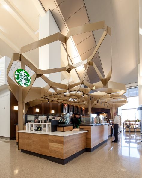 The Starbucks store at T51 in the Los Angeles Airport celebrates the craft of coffee making. Wagner and fellow designer Jennifer Porteous drew inspiration for the design from the pattern of foamy milk at the top of a handcrafted latte. Starbucks Interior, Coffee Shop Lighting, Café Starbucks, Cafe Idea, Starbucks Design, Coffee In Bed, Starbucks Store, Warehouse Conversion, Coffee Drawing