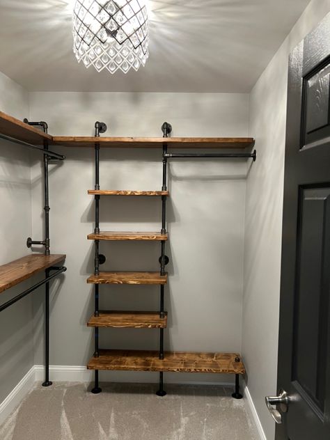 Customizable closets shipped and delivered to your door. Home & office Farmhouse Style Closet, Farmhouse Closet Organization, Open Room Closet Ideas, Black Iron Closet Ideas, Industrial Style Walk In Closet, Small Hunting Closet Ideas, Pipe Shelf Closet, Cabin Closet Ideas, Black Pipe Closet Ideas