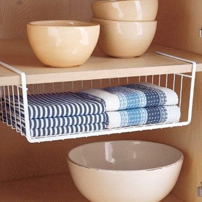 kitchen towel storage (container store) Kitchen Towels Storage, Under Shelf Storage, Under Shelf Basket, Kitchen Rails, Shelf Baskets Storage, Lid Storage, Kitchen Cabinet Organization, Towel Storage, Up House