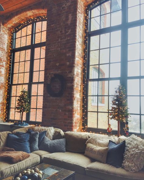 Cozy loft style apartment - christmas decor. Exposed brick wall with tall ceilings and stained concrete floors. Old cotton mill. Cozy Apartment Decor, Loft Style Apartments, Loft Style Apartment, Christmas Decorations Apartment, Cozy Loft, Apartment Decorating Living, Apartment Loft, Christmas Apartment, Loft Stil