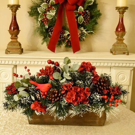 Our Frosted Snow covered pine centerpiece with red berries is a perfect design to use all winter long. Created in a long rectangle wooden box and accented with a red cardinal Pinecone Centerpiece, Christmas Floral Designs, Christmas Greens, Faux Christmas, Christmas Centers, Winter Centerpieces, Centerpieces Diy, Christmas Planters, Christmas Flower Arrangements