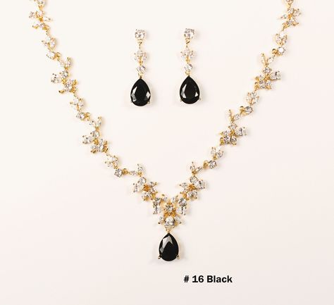 "The default will be: \"Black CZ Stone, Kraft/Tan box with twine  & no message\". If you need different colored Stone, please check the stone color chart in last photo &  specify the color number in checkout notes section. This three pieces jewelry set is made with high quality AAA cubic zirconia on triple white gold plated set.  The necklace has 15 CZ sections linked with a Teardrop CZ pendant size of 12 x16mm. Total length is 17-19 inches adjustable. Let me know if you would like customized to different length. Bracelet has 6 CZ sections linked to size of 6.5 inch. Extend clasp included to fit wrist size 6.5 ~7.5 inch. if you need custom length, please contact me for detail.  Drop Earring pendant size is 12x16mm, with total length 1.25 inch.  Earring has been triple plated to ensure tota Jewelry For Black Bridesmaid Dress, Black Outfit Gold Jewelry, Black Tie Jewelry, Black Wedding Jewelry, Gold Jewelry Prom, Ethereal Jewelry, Black Pendant Necklace, Wedding Jewelry Set, Bridal Jewelry Set