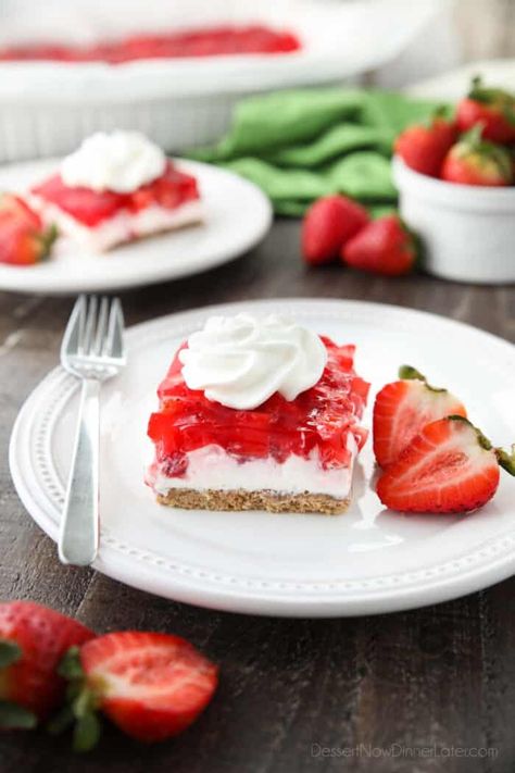 Strawberry Delight is a layered dessert much like a strawberry cream cheese pie, but feeds a crowd. With a graham cracker pecan crust, no bake cheesecake filling, and fresh strawberries in jello. Serve it with sweetened whipped cream on top for a light and fruity dessert. Dessert With Graham Cracker Crust, Jello Cream Cheese, Graham Cracker Crust Dessert, Strawberry Jello Dessert, Graham Dessert, Strawberry Jello Salad, Graham Cracker Dessert, Strawberry Cream Cheese Pie, Cracker Dessert