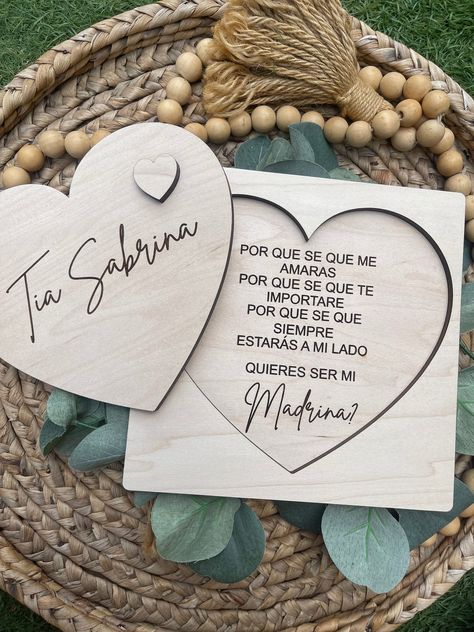 Such a cute and memorable way to make a proposal for a future madrina, padrino or both This is a laser cut and engraved heart proposal that can be kept for years to come. Made out of real maple plywood, this removable heart is the perfect gift for a godparent proposal.  Sign pictured measures 6.5x6.5 Additional size options -5x5 -8x8 Will You Be My Madrina Ideas, Nina Proposal Ideas, Will You Be My Nina Ideas, God Parents Proposal Ideas, Quieres Ser Mi Madrina Ideas, Will You Be My Godparents Proposal, Madrina Proposal Ideas, Godparents Proposal Ideas, Heart Proposal