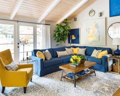 bright living room // blue and yellow decor // blue sectional sofa // slanted ceiling Blue And Yellow Living Room, Blue Couch Living, Blue Sofa Living, Blue Sofas Living Room, Blue Couch Living Room, Blue Living Room Decor, Blue Couches, Yellow Living Room, Blue Living Room