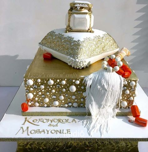 Gold Cake Design, White And Gold Cake, African Wedding Cakes, Gold And White Cake, Nigerian Wedding Dresses Traditional, Pillow Cake, Pillow Cakes, Nigerian Traditional Wedding, Traditional Wedding Cakes