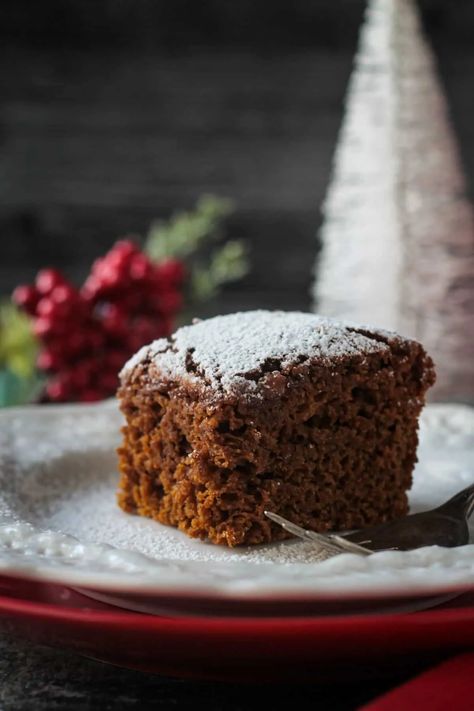 There is nothing more holiday than the flavors of gingerbread! Warm spices and sweet molasses come together in this soft, moist cake. It tastes and smells like heaven! With a dusting of powdered sugar, this Vegan Gingerbread Cake Recipe is Christmas perfection! Gluten Free Gingerbread Cake, Gingerbread Cake Recipe, Gluten Free Gingerbread, Vegan Gingerbread, Gingerbread Cake, Healthier Recipes, Paleo Treats, Vegan Christmas, Gluten Free Cakes